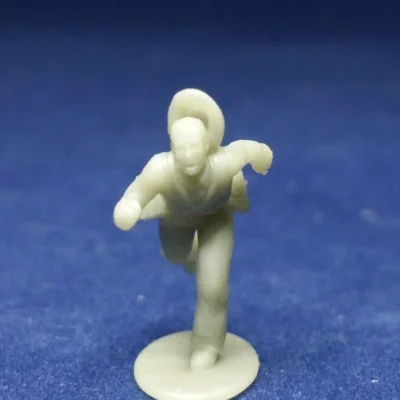 Soldier running in panic hat falling off w