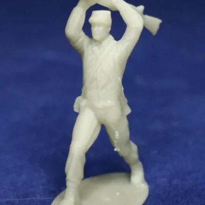 Confederate in kepi swings musket