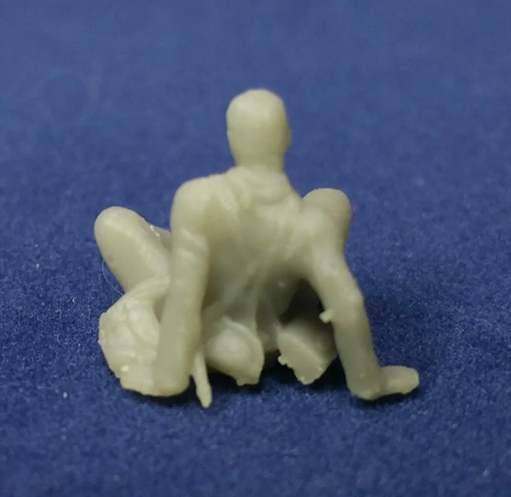 Wounded sitting on ground bare head - Image 2