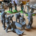 Confederate canoneer in kepi moving cannon wheel photo review