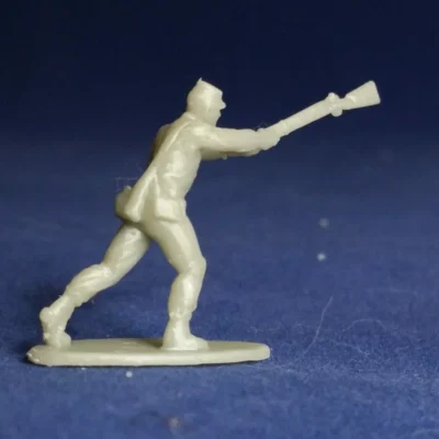 Soldier swings musket forward kepi