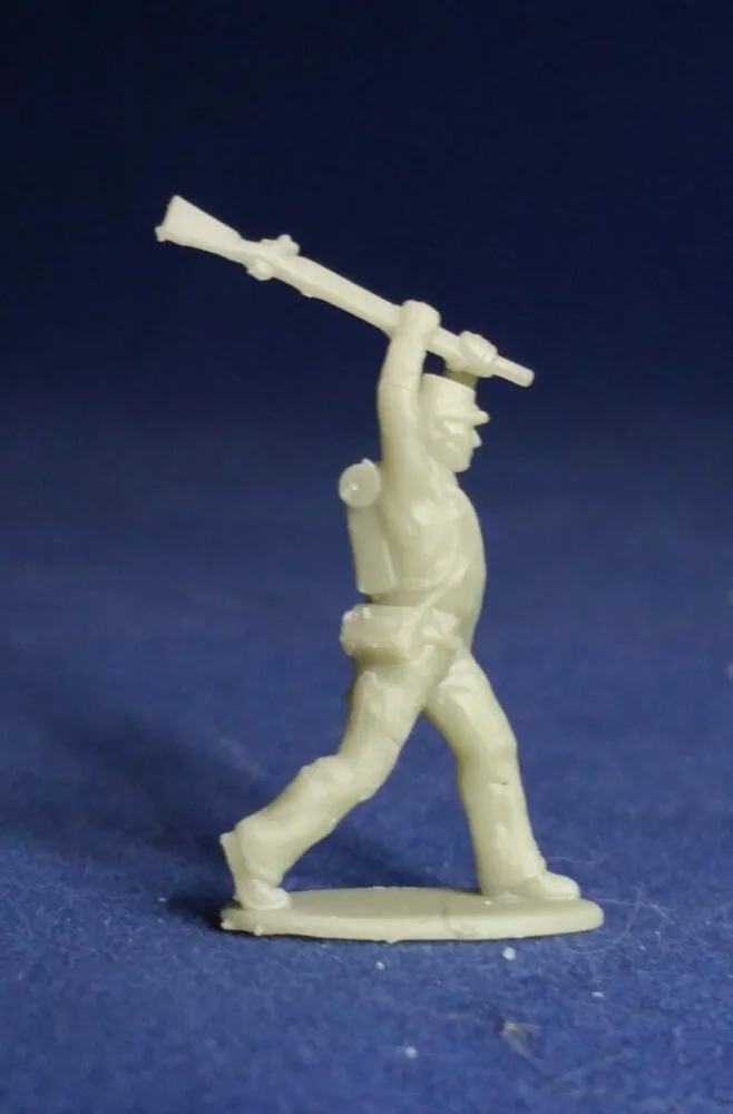 Confederate in kepi swings musket