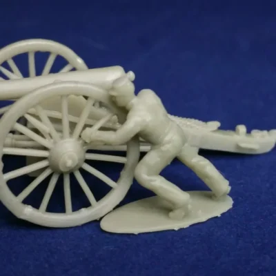 Union canoneer in kepi moving cannon (for left wheel)