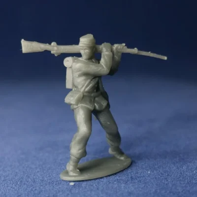 Union private swings musket from shoulder in kepi