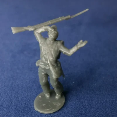 Soldier hit by bullet kepi