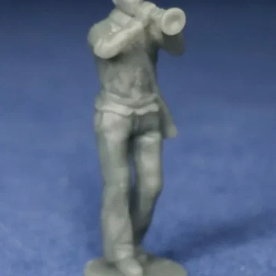 Trumpet player walking in kepi w