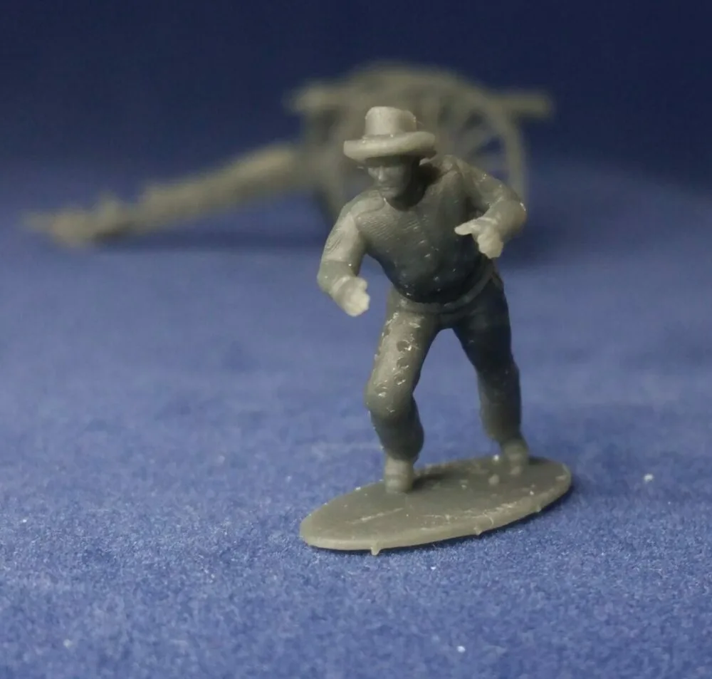 Confederate canoneer in hat moving cannon for right wheel - Image 2