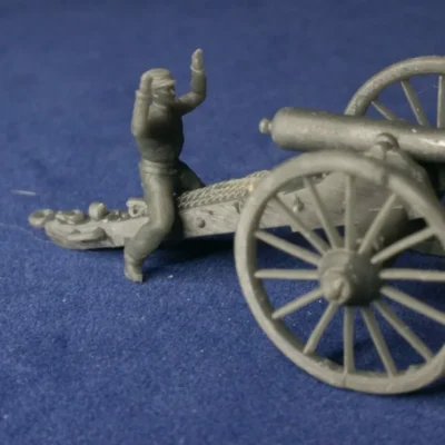 Confederate gunner in kepi setting sight