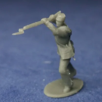 Union soldier in kepi & blanket roll bayoneting