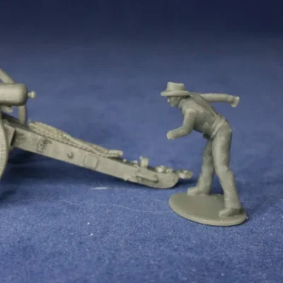 Confederate canoneer in hat pulling lanyard