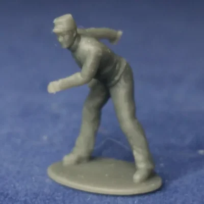 Union canoneer in kepi pulling lanyard