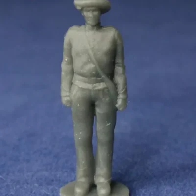 Confederate canoneer in hat standing still