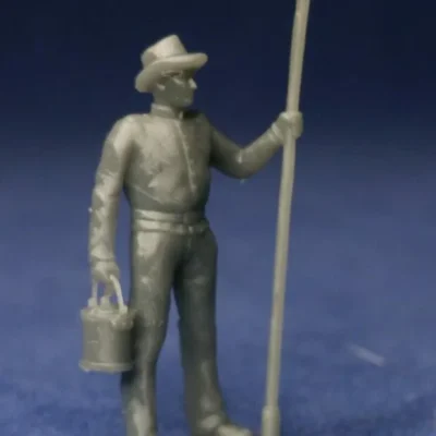 Confederate canoneer in hat with rammer