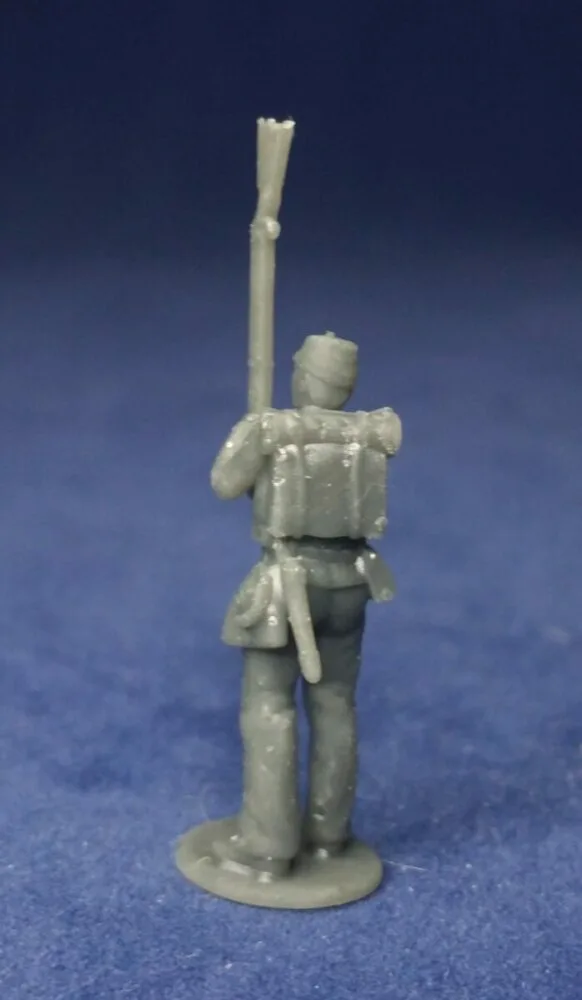 Confederate in kepi surrendering rifle up - Image 2