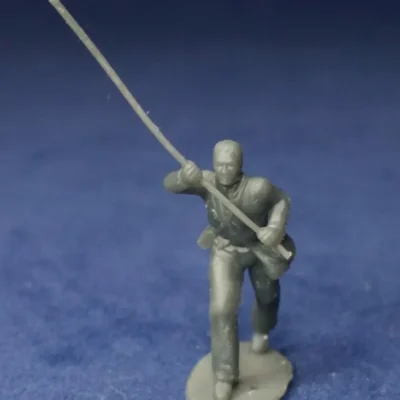 Soldier colorbearer bare head advancing