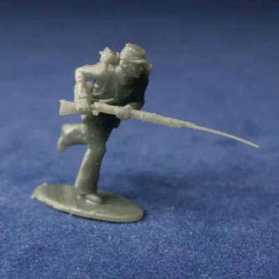 Union in kepi charging