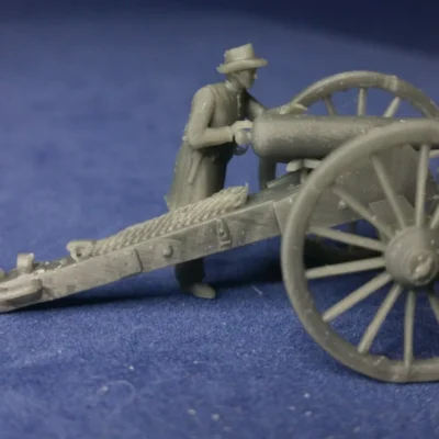 Gunner in hat aiming cannon