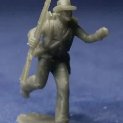 Confederate soldier in hat fleeing