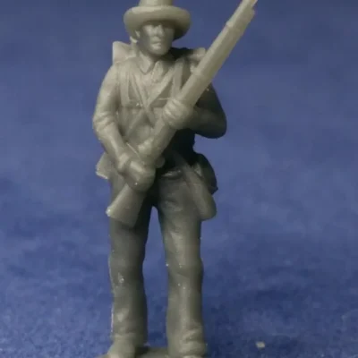 Confederate private standing still in hat