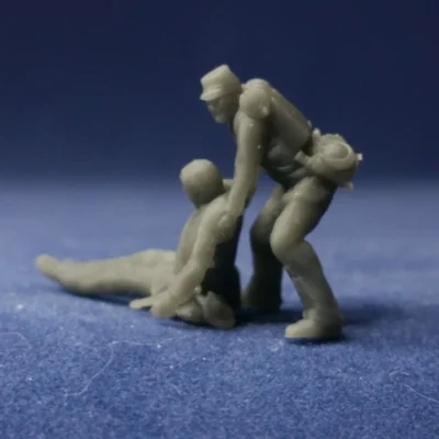 Union soldier dragging wounded w