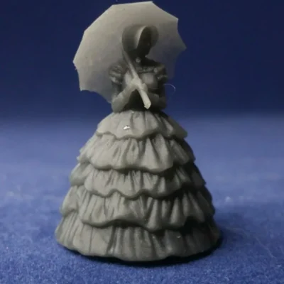 Lady in hoop skirt with bonnet w