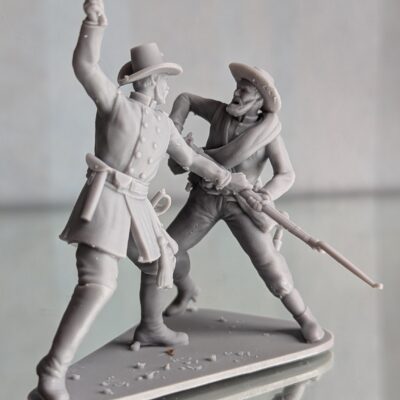 Union officer beating Confederate soldier with revolver