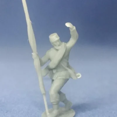 Union colorbearer in kepi and rolled blanket rallying