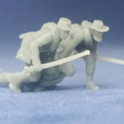 Confederate soldiers dragging casualty