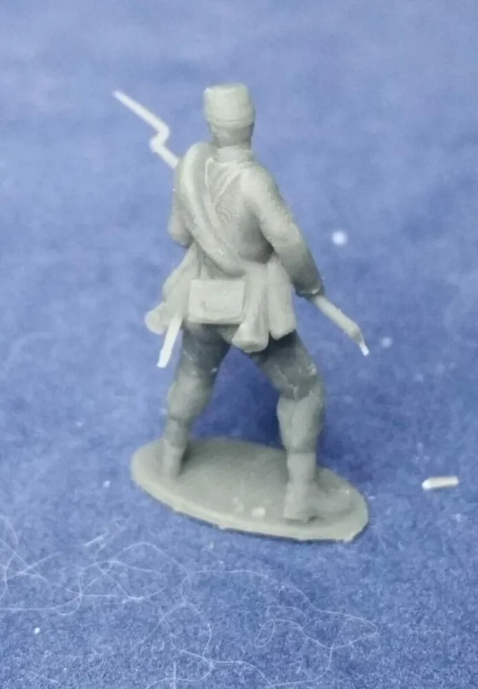 Confederate private in kepi and rolled blanket in defensive pose - Image 2