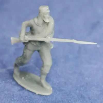 Soldier advancing in havelock