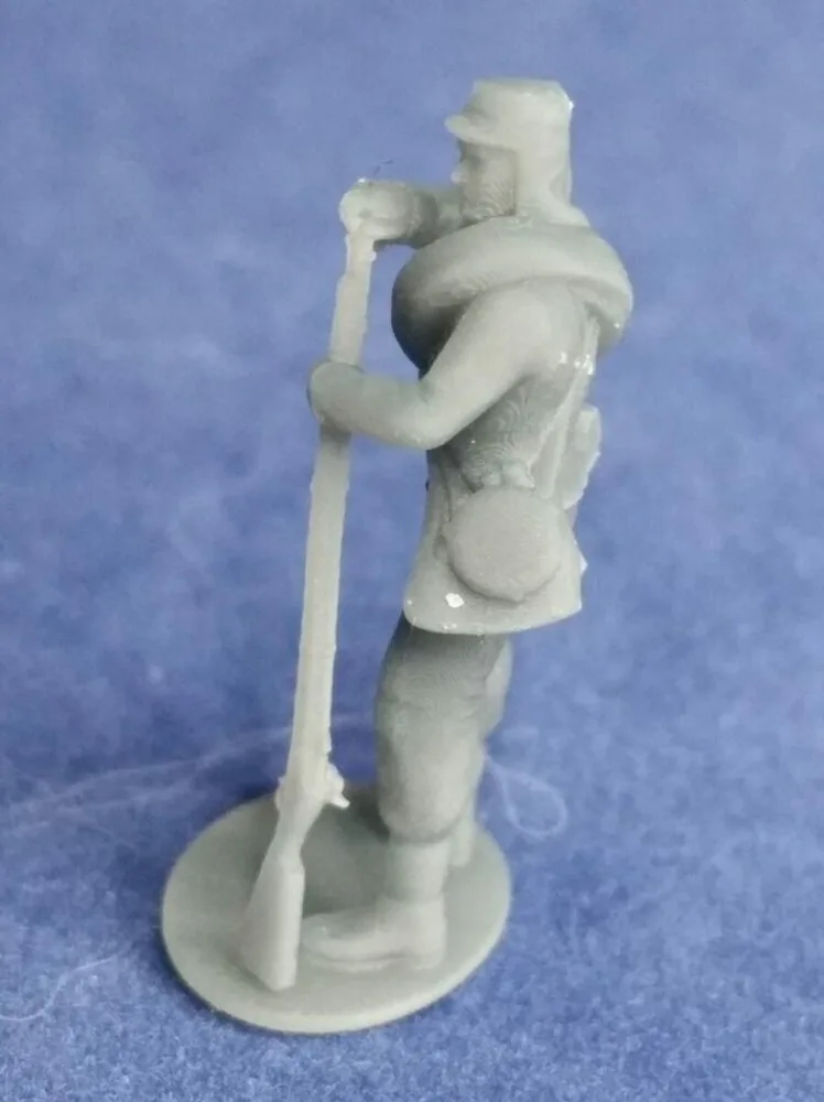 Private in havelock and rolled blanket loading musket - Image 2