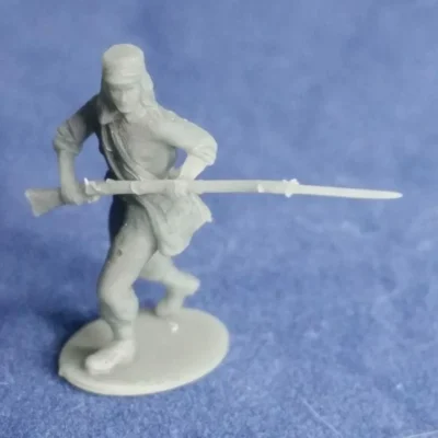 11th NY Fire Zouave advancing in havelock (pants in socks)