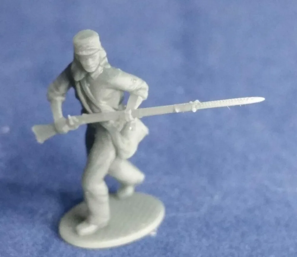 11th NY Fire Zouave advancing in havelock (normal pants)