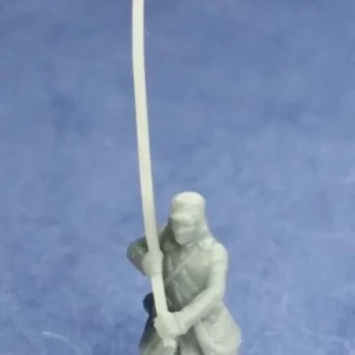 Colorbearer in havelock running with flag