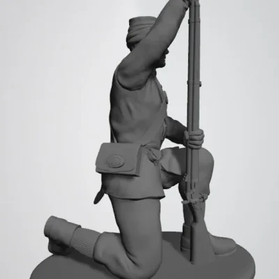 Union private in sack coat and kepi kneeling and loading