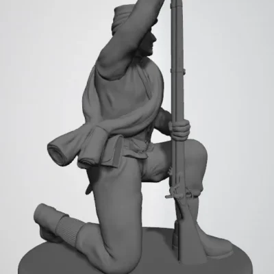 Confederate private in kepi kneeling and loading