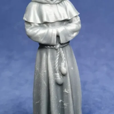 Monk standing still hood on face