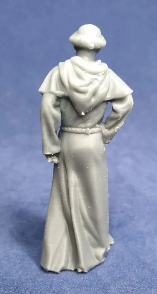 Monk standing still hand on hip hood on back - Image 2