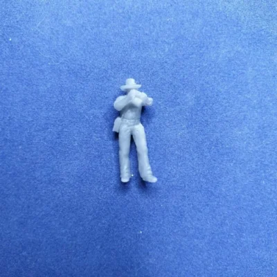 Canoneer picking shell in shirt and slouch