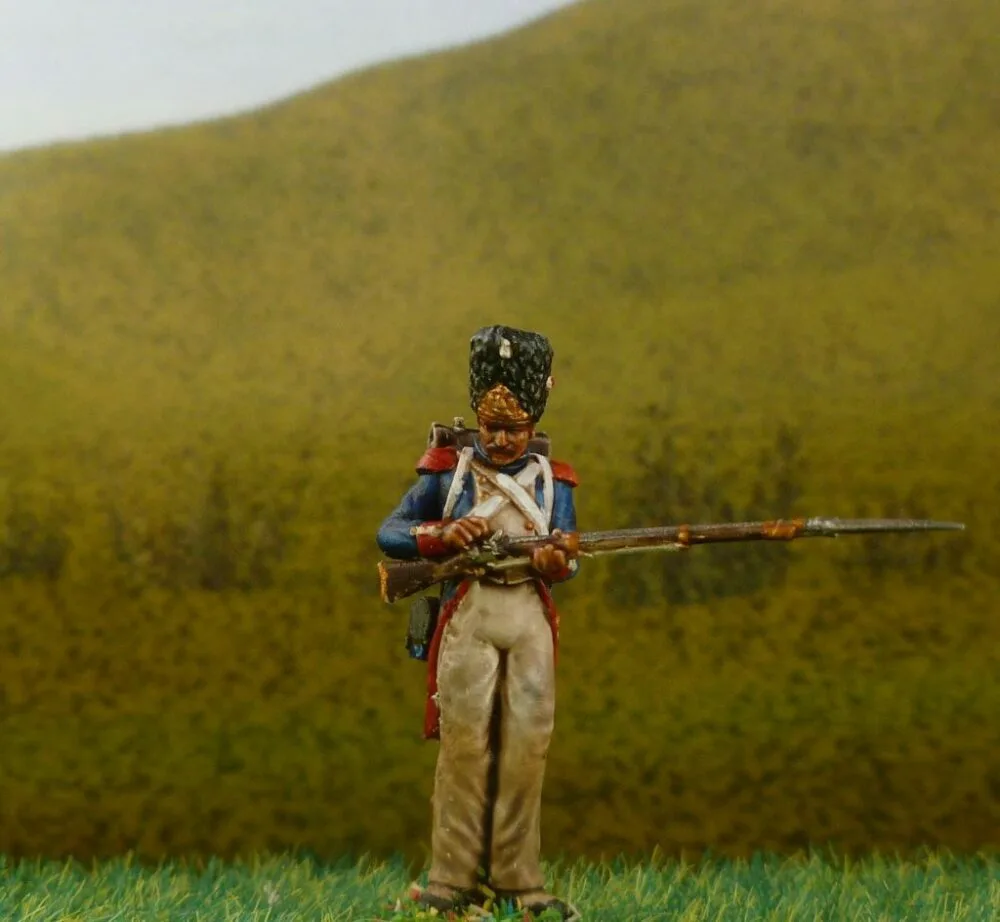 French Grenadier soldier Waterloo 1815 filling powder with bayonet