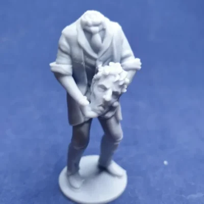 Man holding head in hands CM