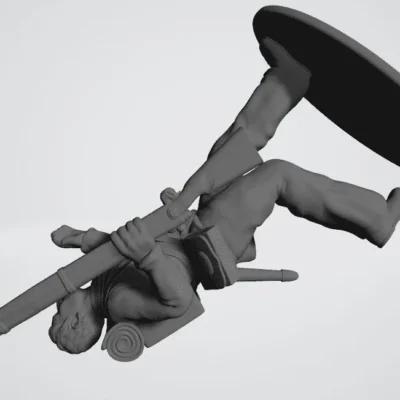 Soldier running with rifle bare head