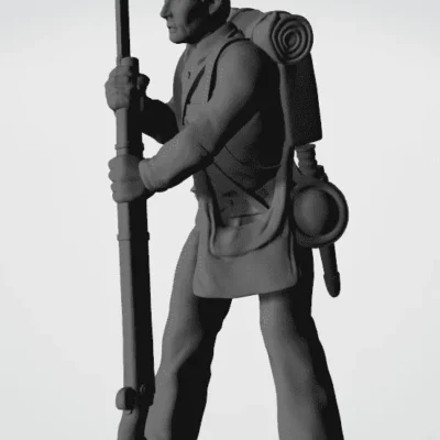 Soldier walking with rifle as stick in kepi