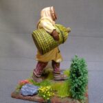 Man carrying bee hive EM photo review