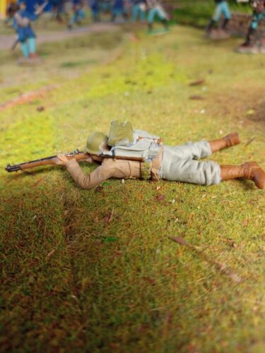American GI soldier D-day shooting lying on stomach photo review