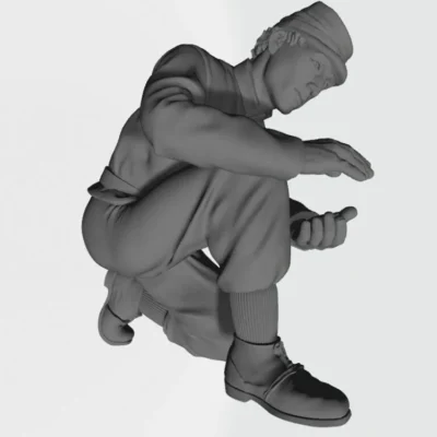 Man patting snowball in kepi