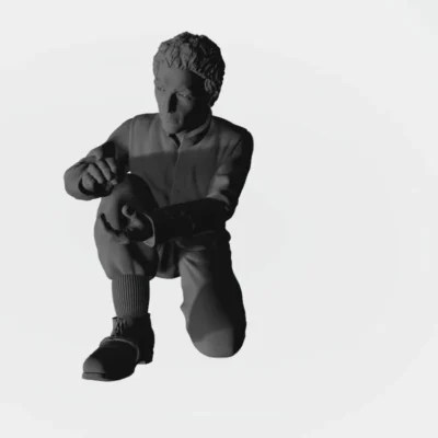 Man patting snowball