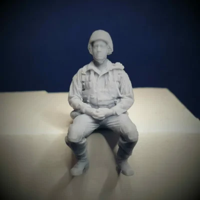 Swedish Modern Soldier in M90 Uniform - sitting