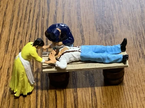 Surgeon at field hospital photo review