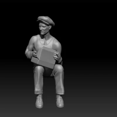 Civilian sitting with hand in box